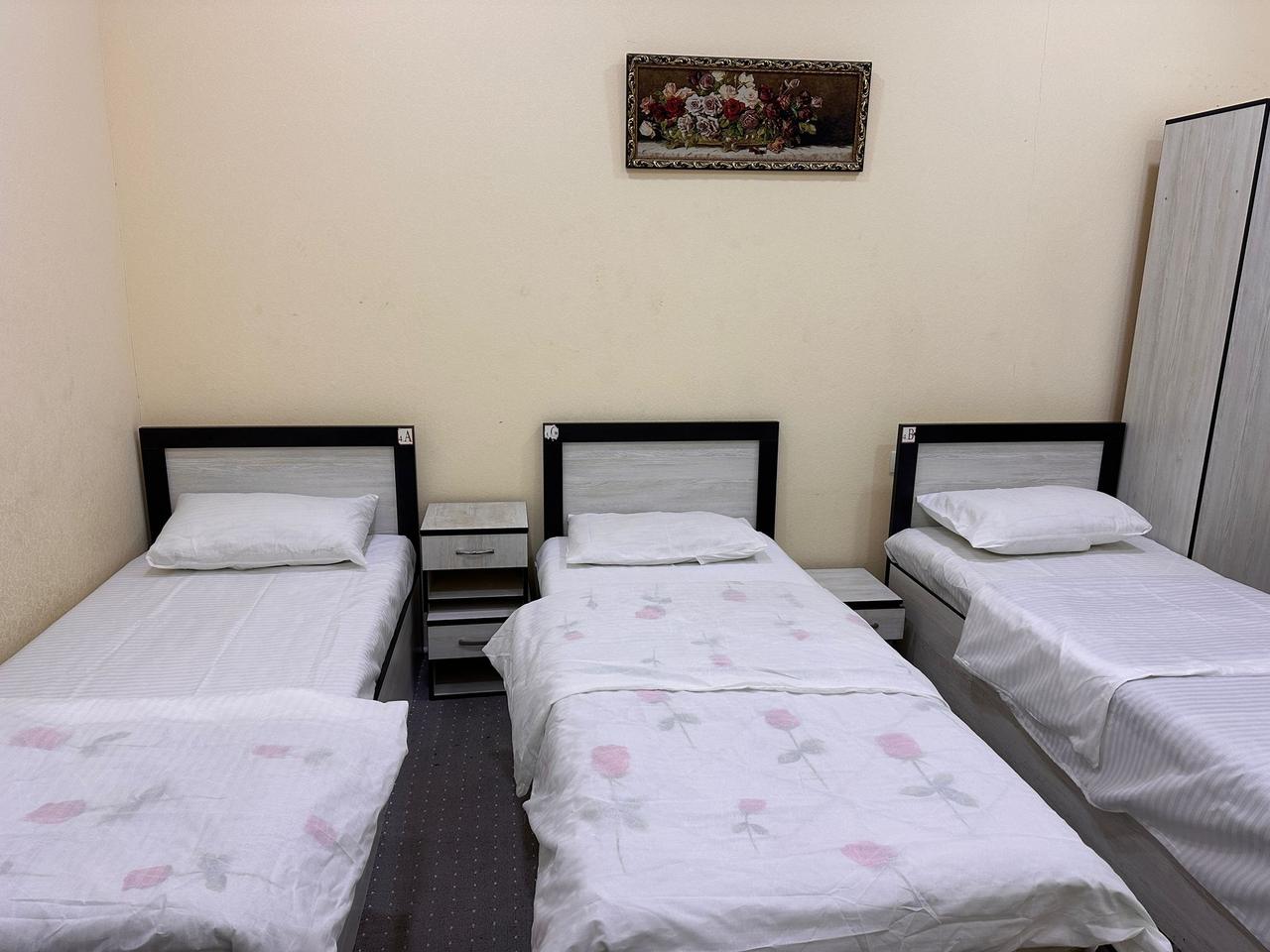Private room with three single beds
